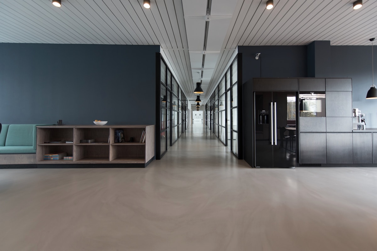 A quiet modern studio corridor in natural light